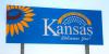 billboard with the worlds "Kansas welcomes you" and a sunflower